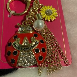 Juicy Couture Gold-Tone Red Ladybug Keychain with Sunflower and Pearl Charms